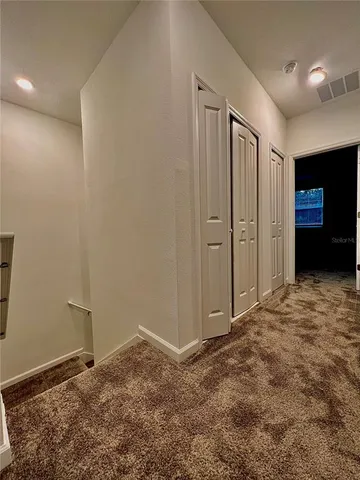 a view of an empty room and window