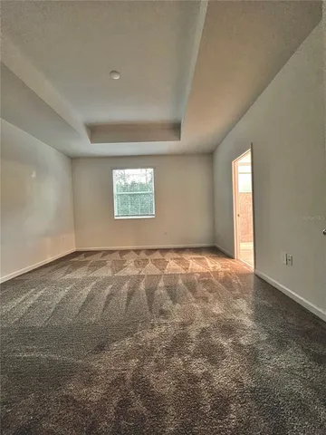 a large bathroom with a sink and a large mirror
