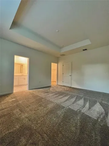 a bathroom with a shower sink and mirror