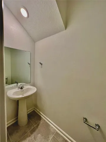 a view of kitchen with furniture and appliances