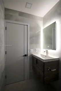 a view of a backyard with sitting area