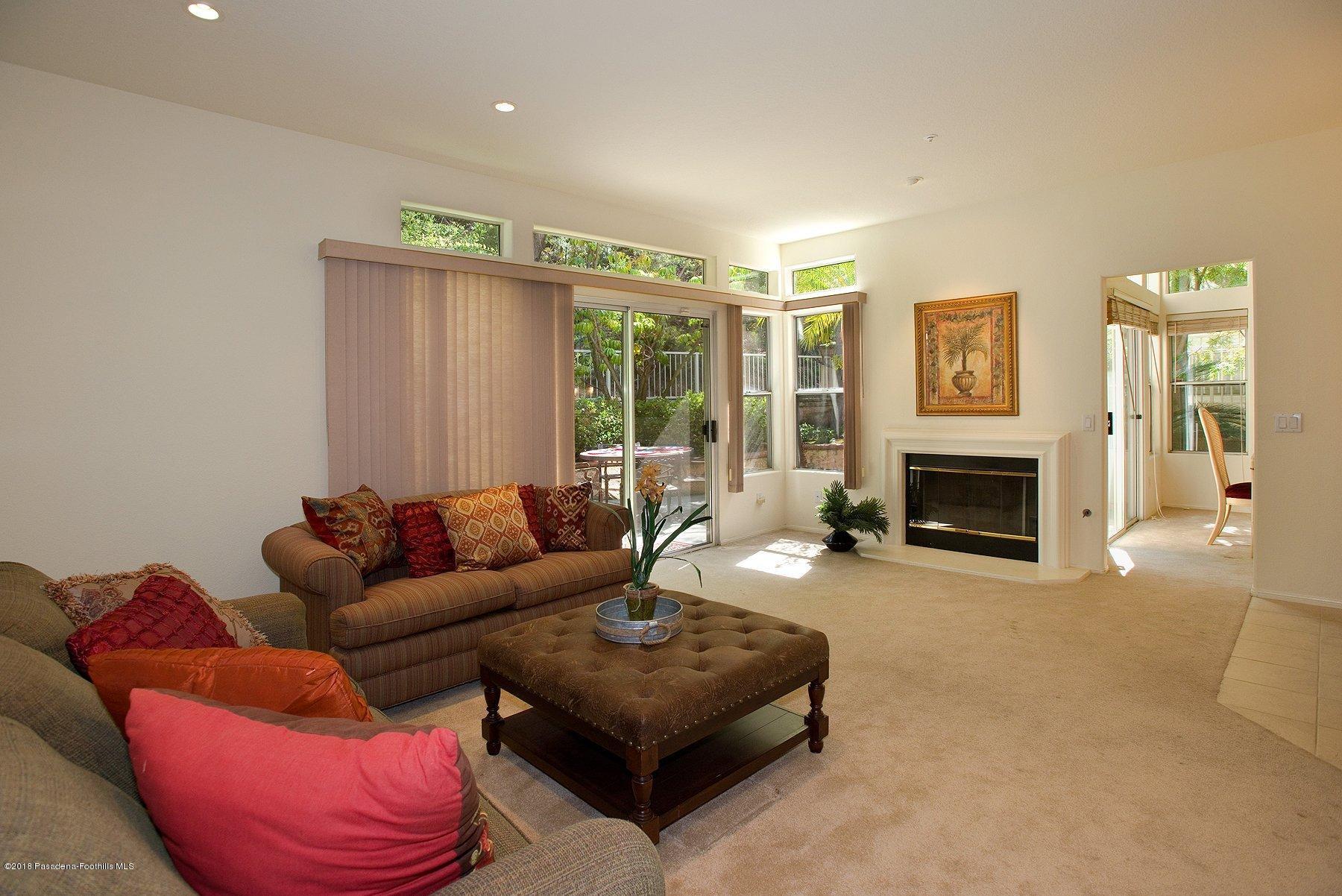 925 C. Amable Glendale, CA 91208 - Photo 13 of 37 a living room with furniture and a fireplace