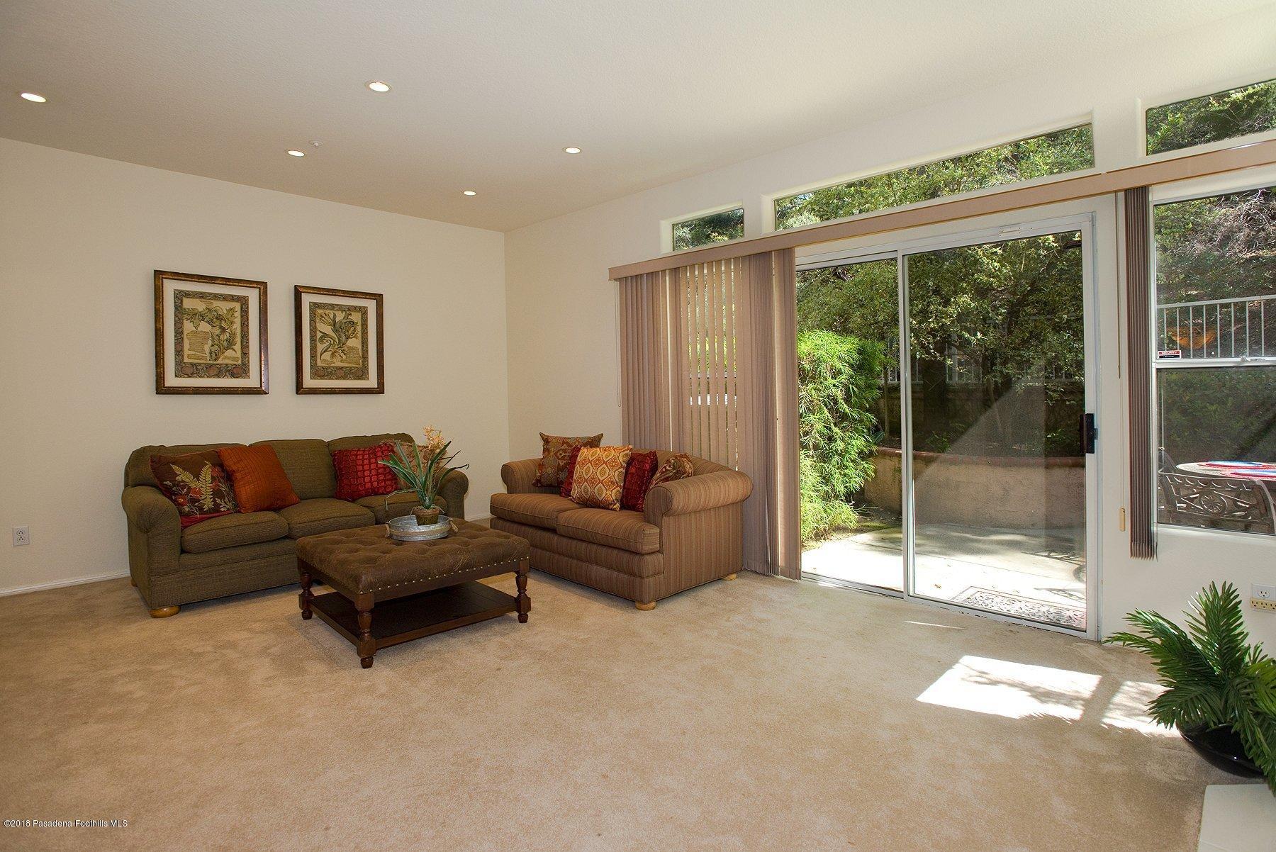 925 C. Amable Glendale, CA 91208 - Photo 14 of 37 a living room with furniture and a large window