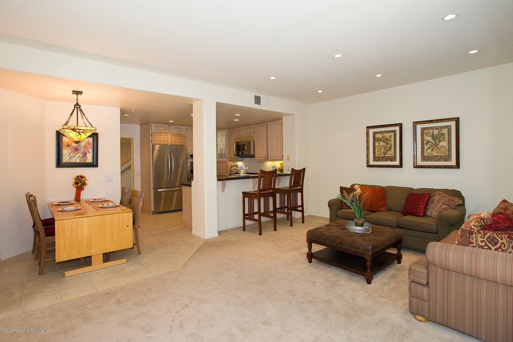 925 C. Amable Glendale, CA 91208 - Photo 16 of 37 a living room with furniture and a table