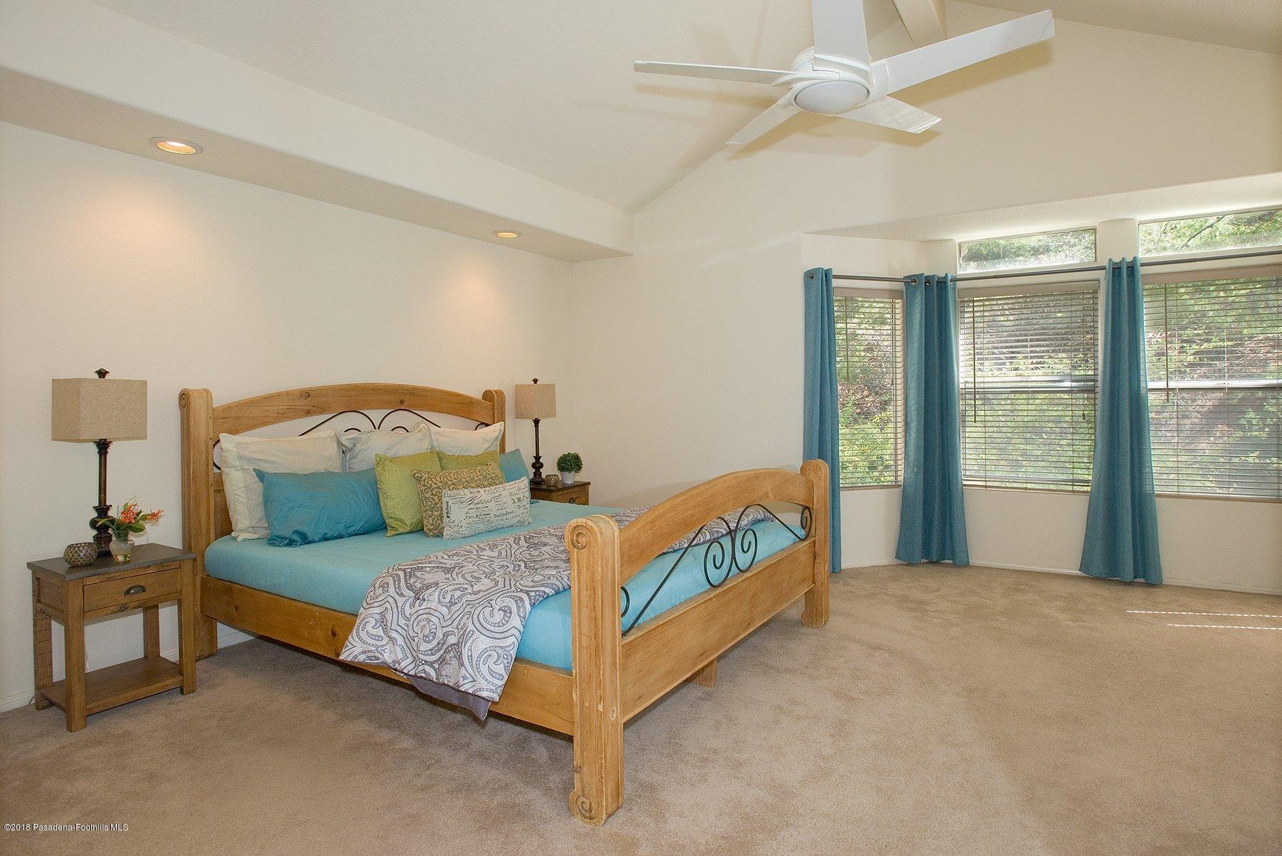 925 C. Amable Glendale, CA 91208 - Photo 30 of 37 a bedroom with a bed and a window