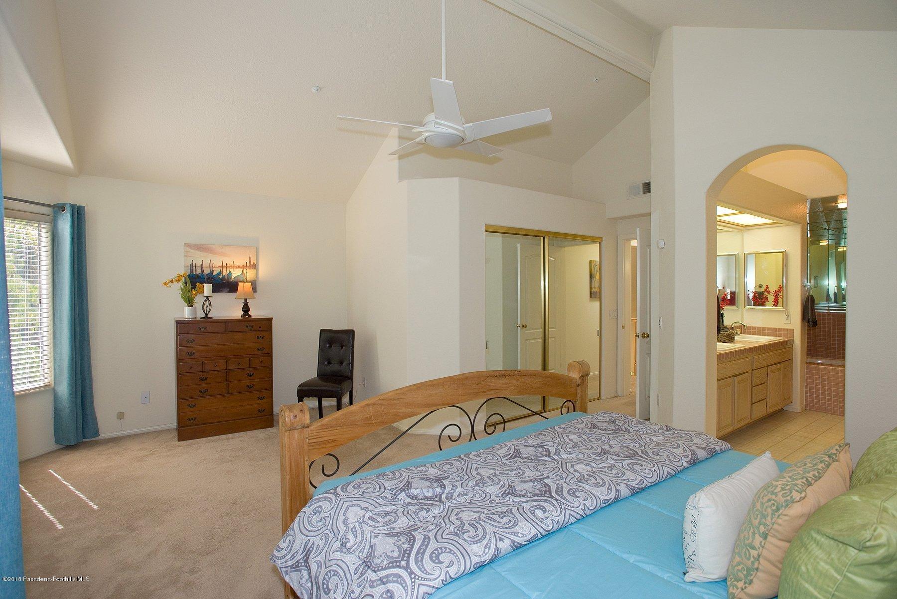 925 C. Amable Glendale, CA 91208 - Photo 31 of 37 a bedroom with a bed and a dresser