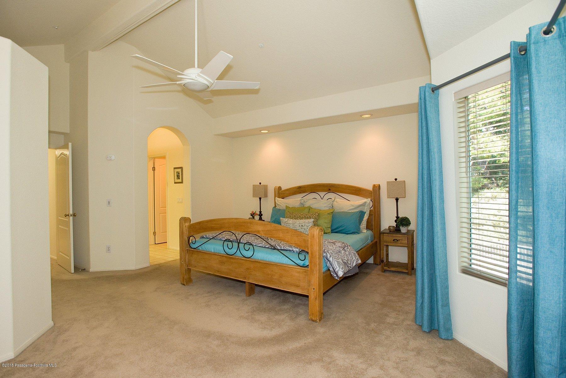 925 C. Amable Glendale, CA 91208 - Photo 32 of 37 a bedroom with a bed and a walk in closet