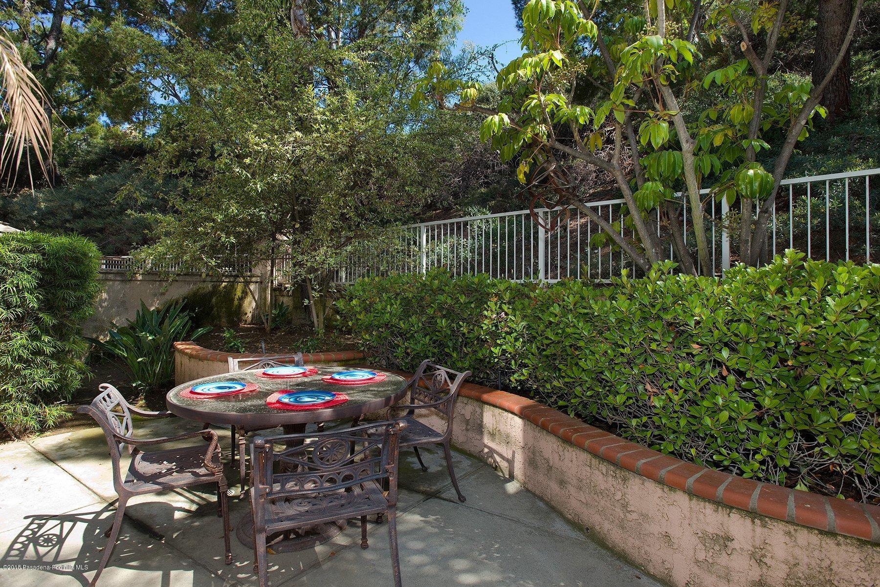 925 C. Amable Glendale, CA 91208 - Photo 37 of 37 a backyard of a house with table and chairs plants