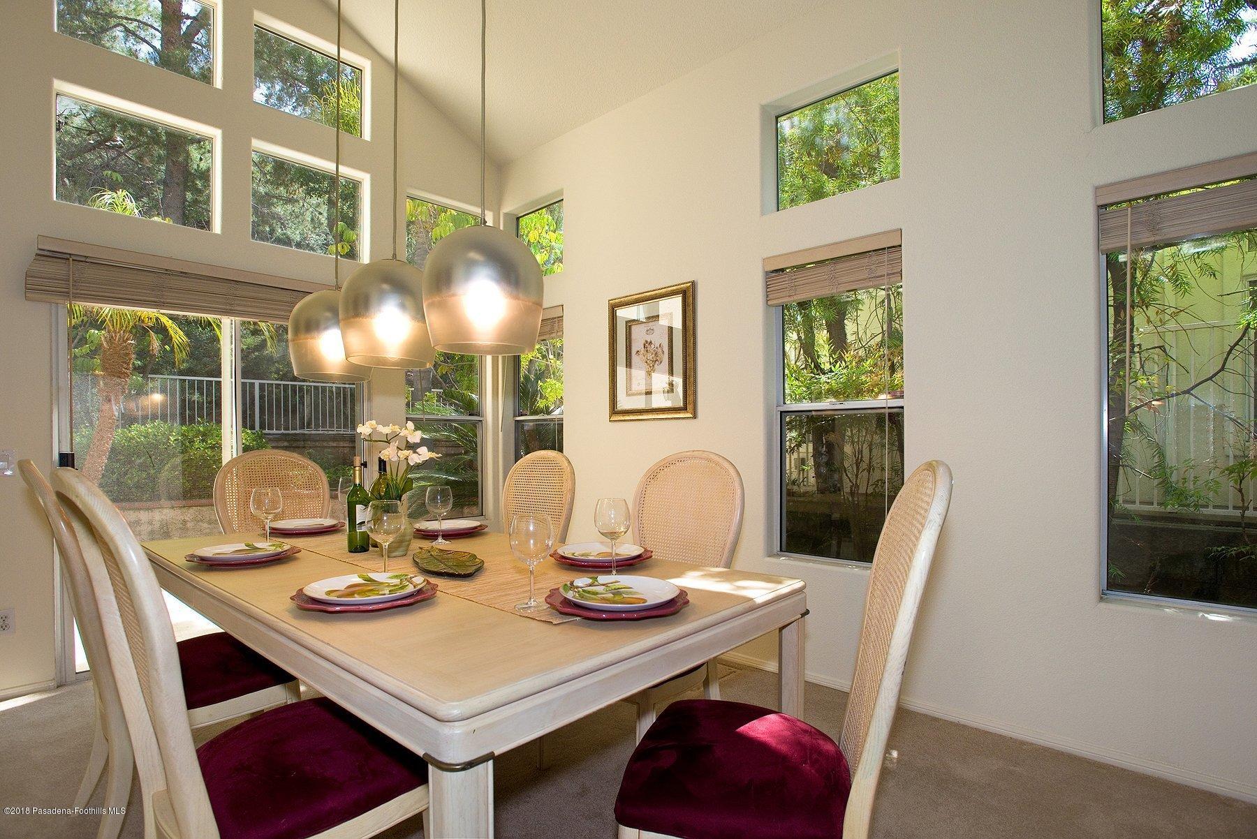 925 C. Amable Glendale, CA 91208 - Photo 7 of 37 a view of a dining room with furniture window and outside view