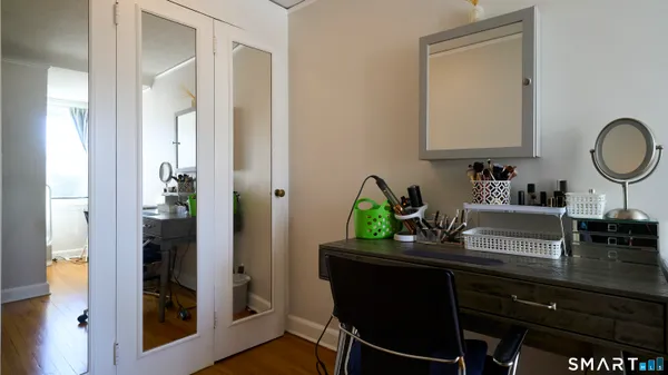 a view of workspace with wooden floor