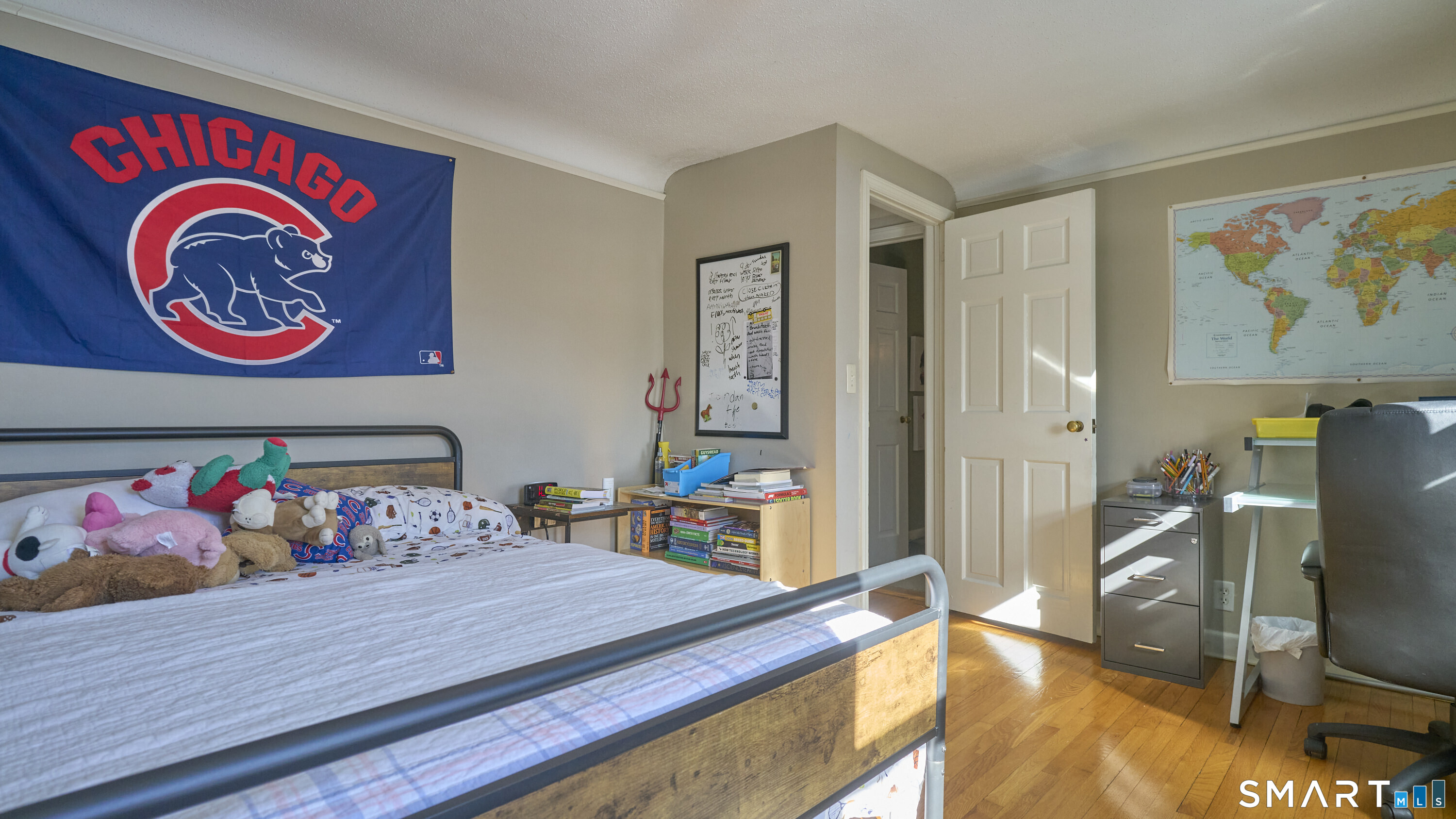 342 South Main Street West Hartford, CT 06107 - Photo 28 of 36 a bedroom with bed and wooden floor