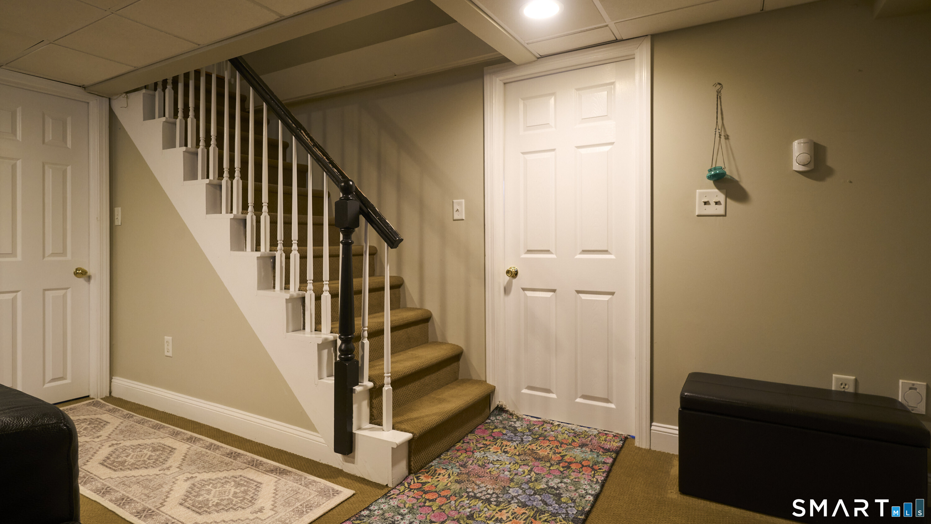 342 South Main Street West Hartford, CT 06107 - Photo 30 of 36 a view of a hallway with wooden floor and staircase