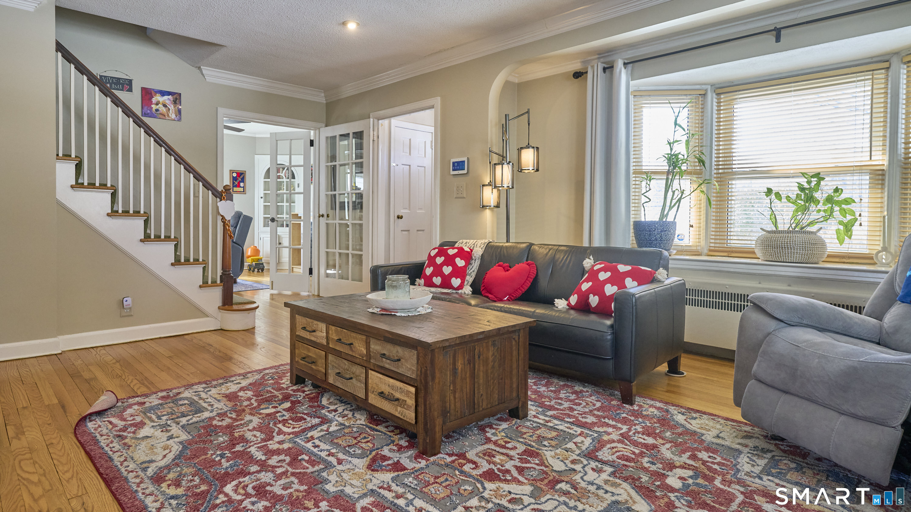 342 South Main Street West Hartford, CT 06107 - Photo 5 of 36 a living room with furniture and a rug