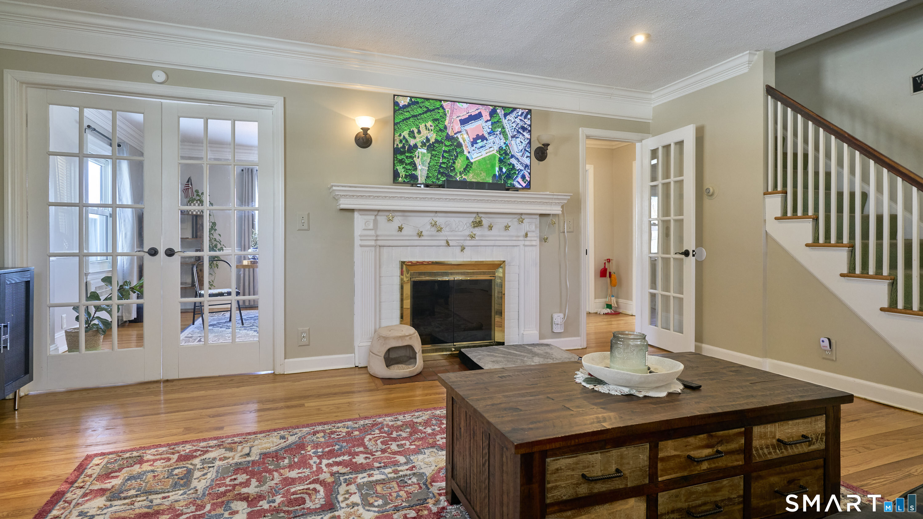 342 South Main Street West Hartford, CT 06107 - Photo 6 of 36 a view of a livingroom with furniture and a fireplace