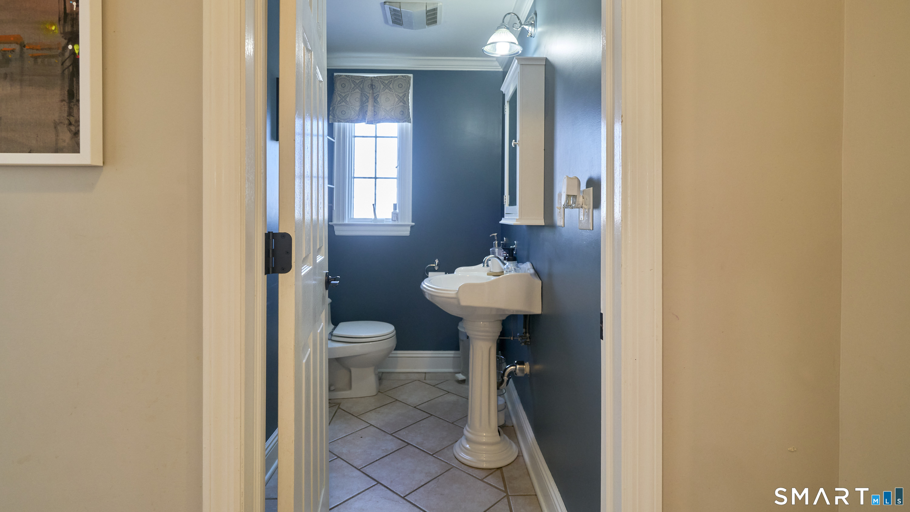 342 South Main Street West Hartford, CT 06107 - Photo 10 of 36 a bathroom with a sink toilet and a mirror
