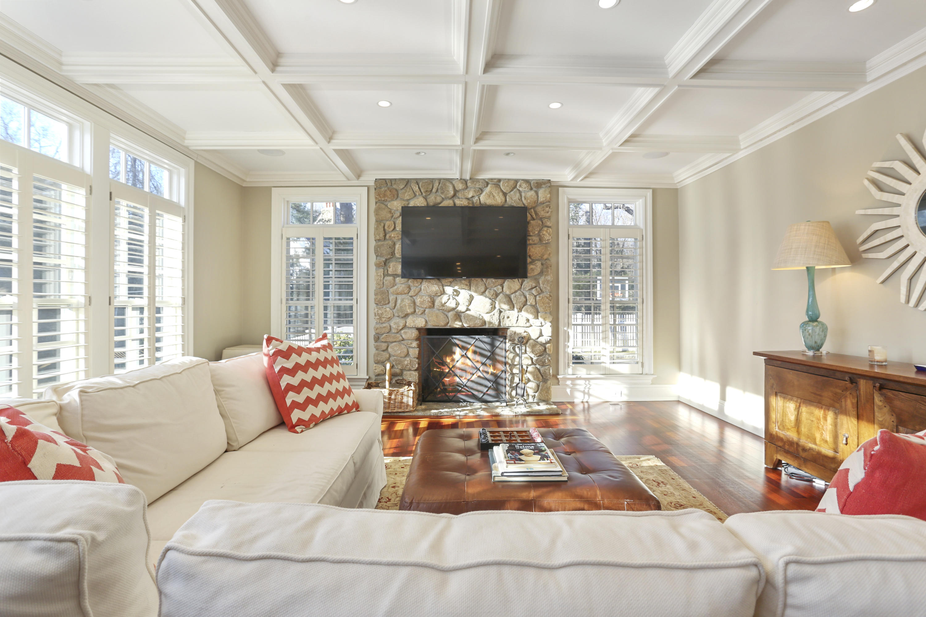 364 Smith Ridge Road New Canaan, CT 06840 - Photo 14 of 39 a living room with furniture a flat screen tv and a large window