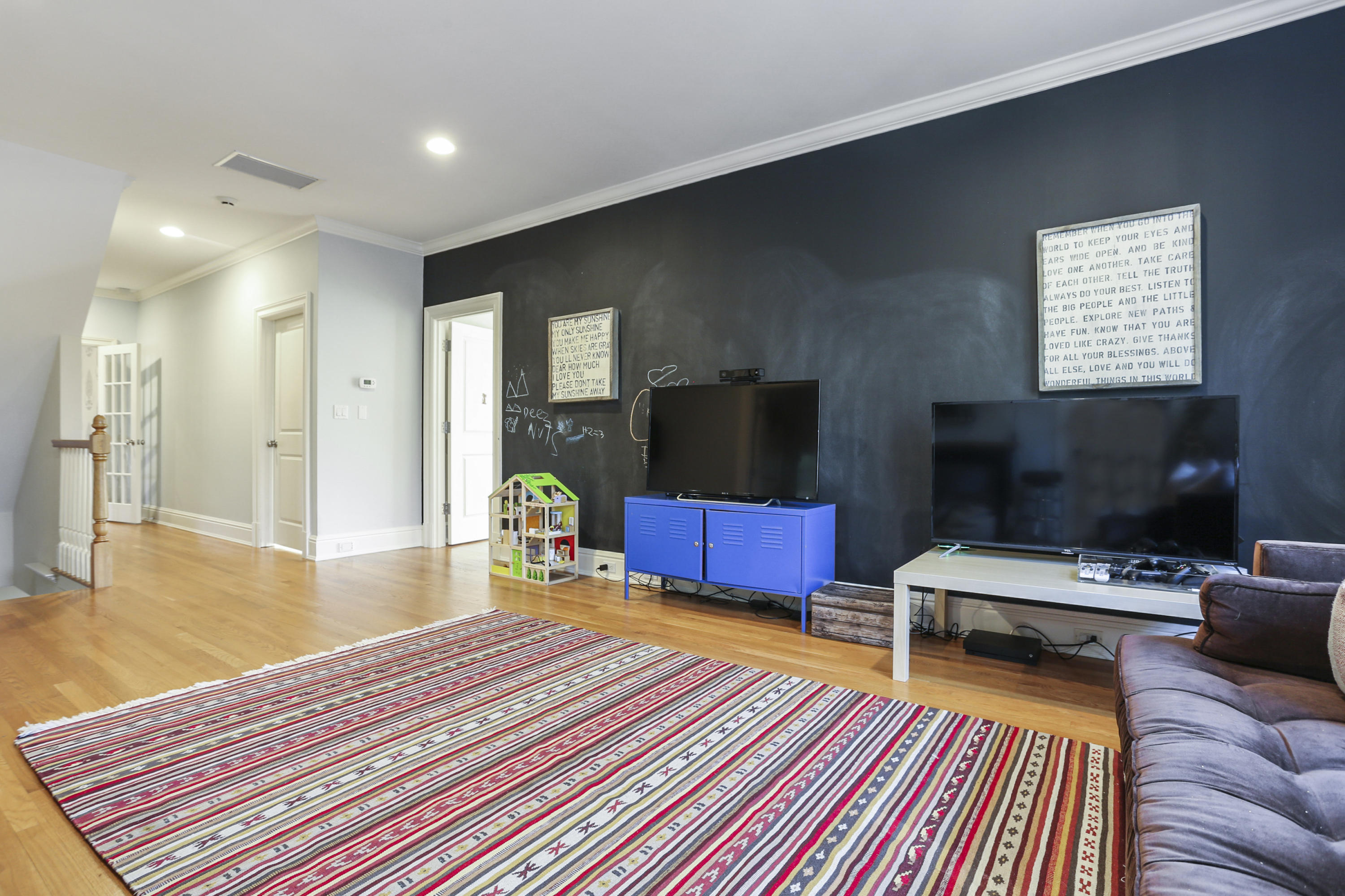 364 Smith Ridge Road New Canaan, CT 06840 - Photo 19 of 39 a living room with furniture and a flat screen tv