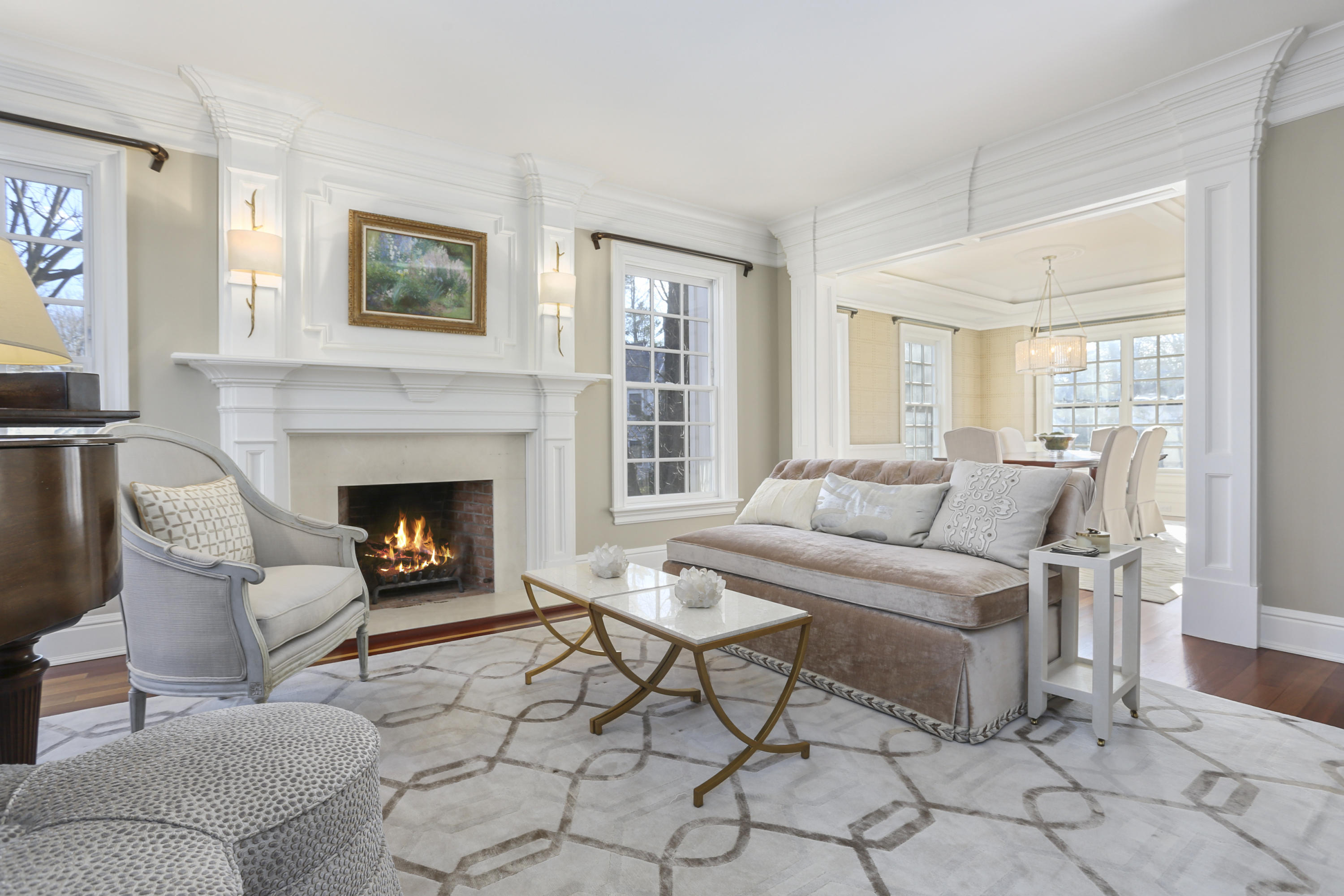 364 Smith Ridge Road New Canaan, CT 06840 - Photo 3 of 39 a living room with furniture and a fireplace