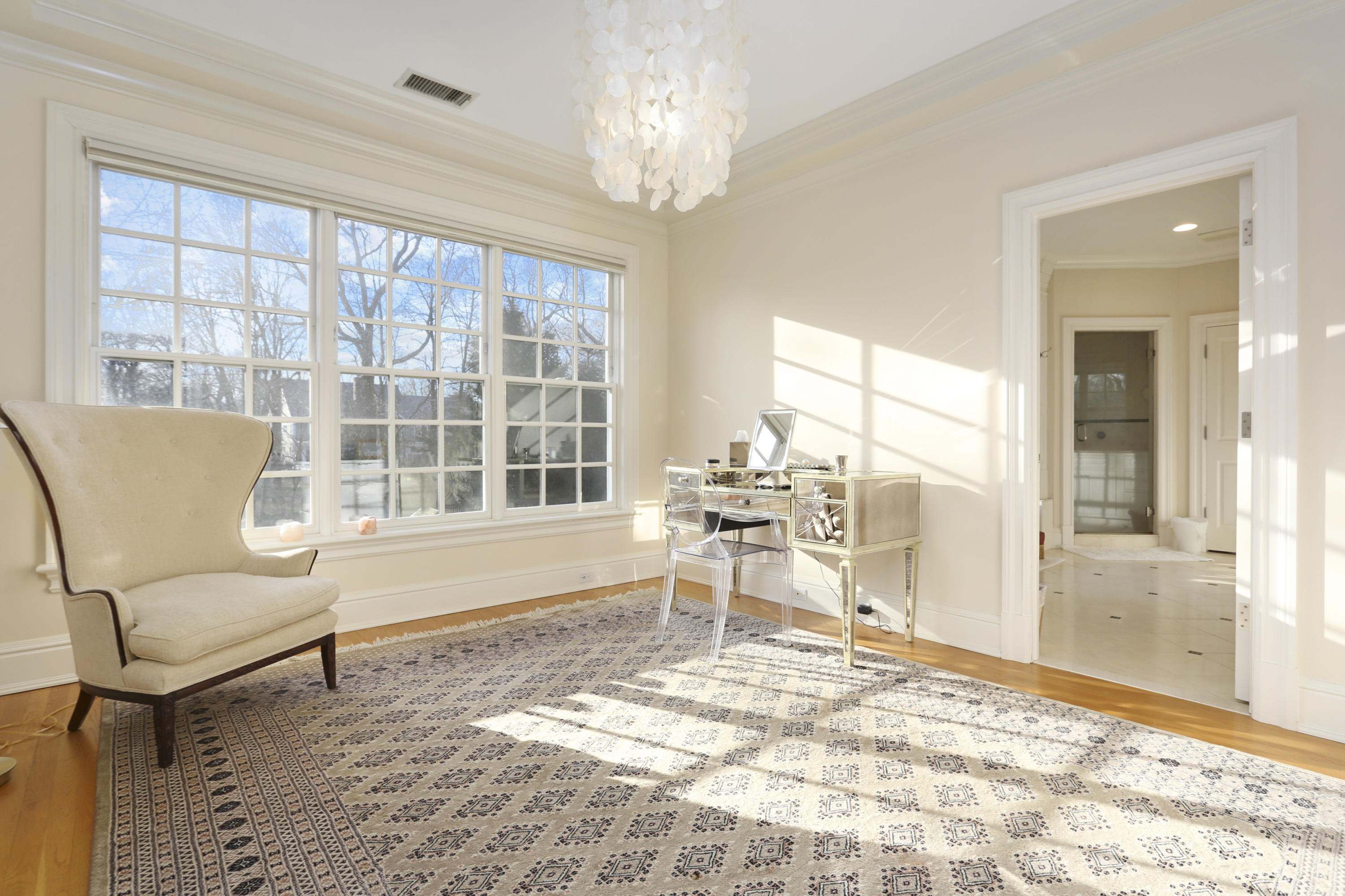 364 Smith Ridge Road New Canaan, CT 06840 - Photo 24 of 39 a living room with furniture and a large window