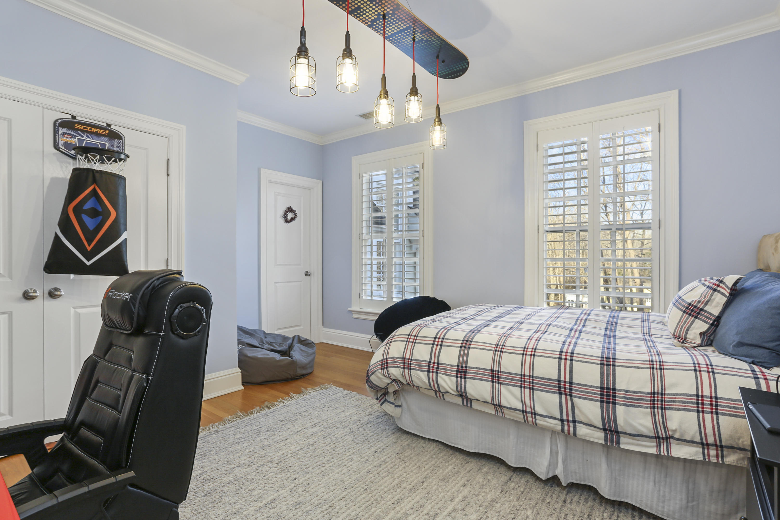 364 Smith Ridge Road New Canaan, CT 06840 - Photo 29 of 39 a bedroom with bed and a window
