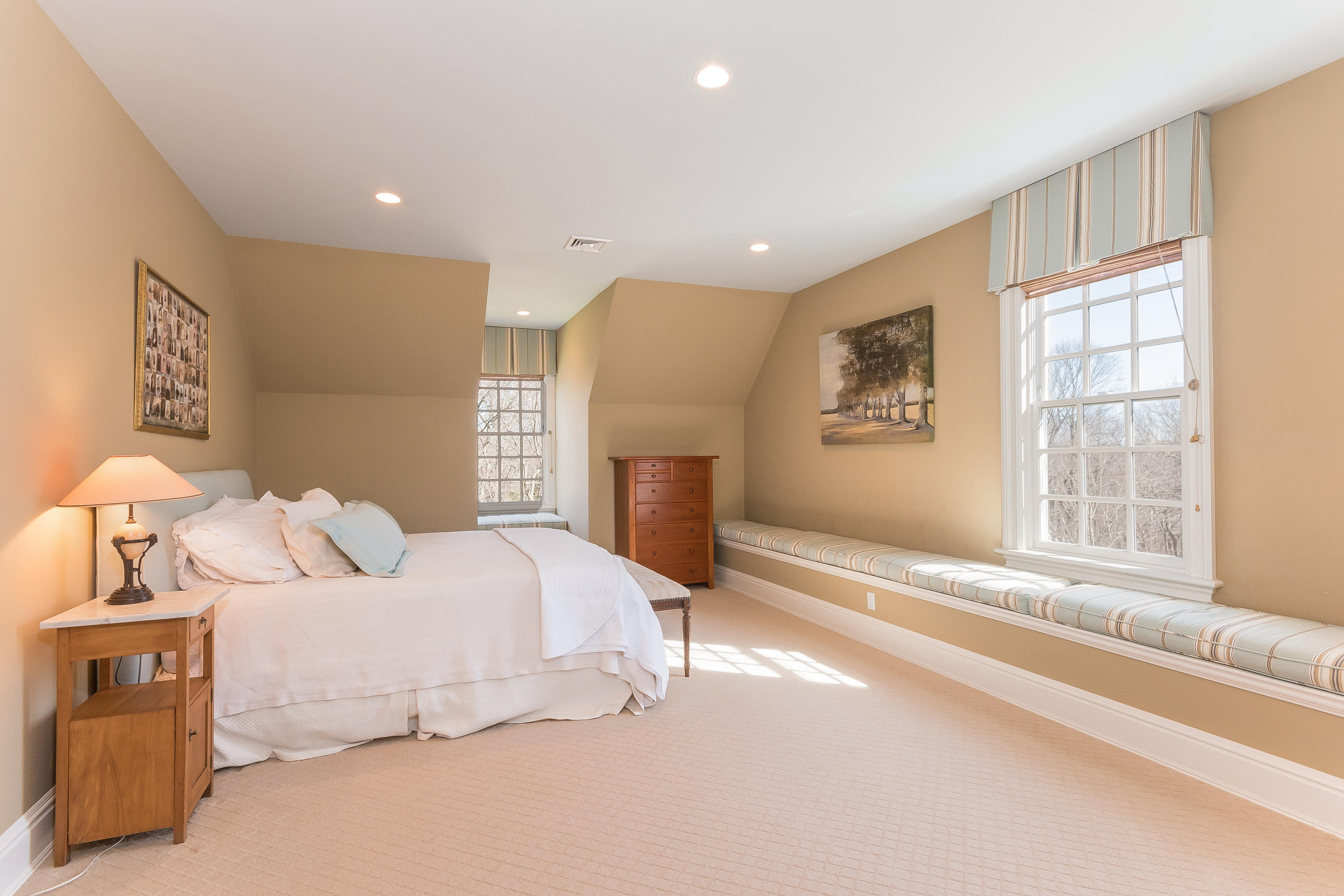 364 Smith Ridge Road New Canaan, CT 06840 - Photo 31 of 39 a bedroom with a bed and a large window