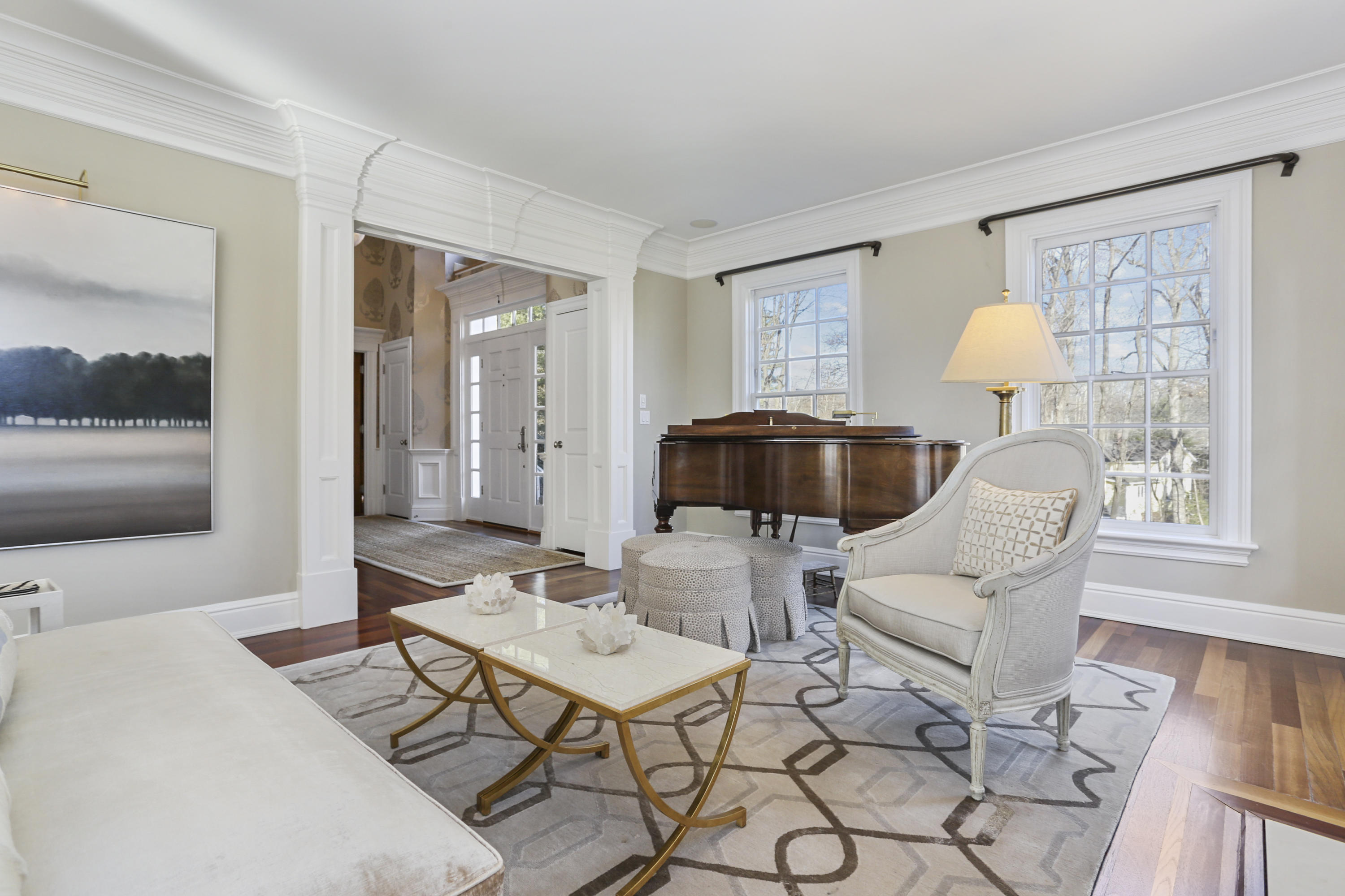 364 Smith Ridge Road New Canaan, CT 06840 - Photo 5 of 39 a living room with furniture and a table