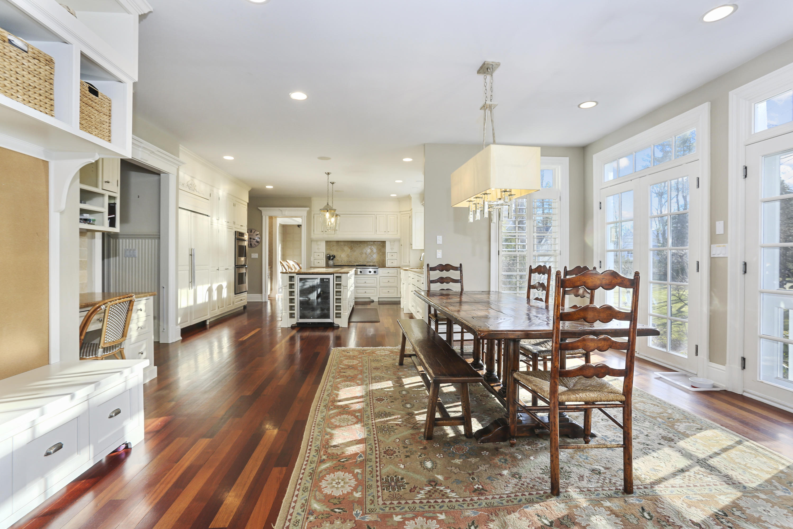 364 Smith Ridge Road New Canaan, CT 06840 - Photo 9 of 39 a view of a dining room with furniture and wooden floor