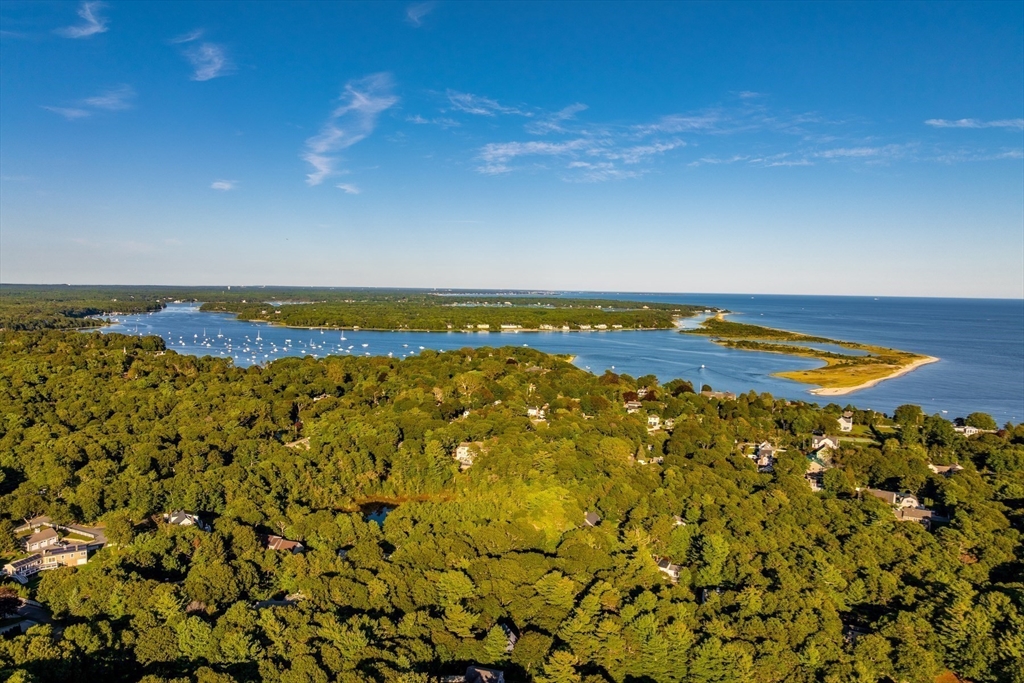46 Oak Street Barnstable, MA 02635 - Photo 31 of 40 a view of an empty room with a lake view