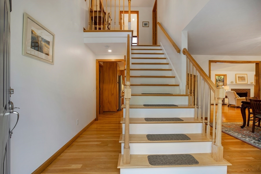 46 Oak Street Barnstable, MA 02635 - Photo 7 of 40 a view of entryway and hall with wooden floor