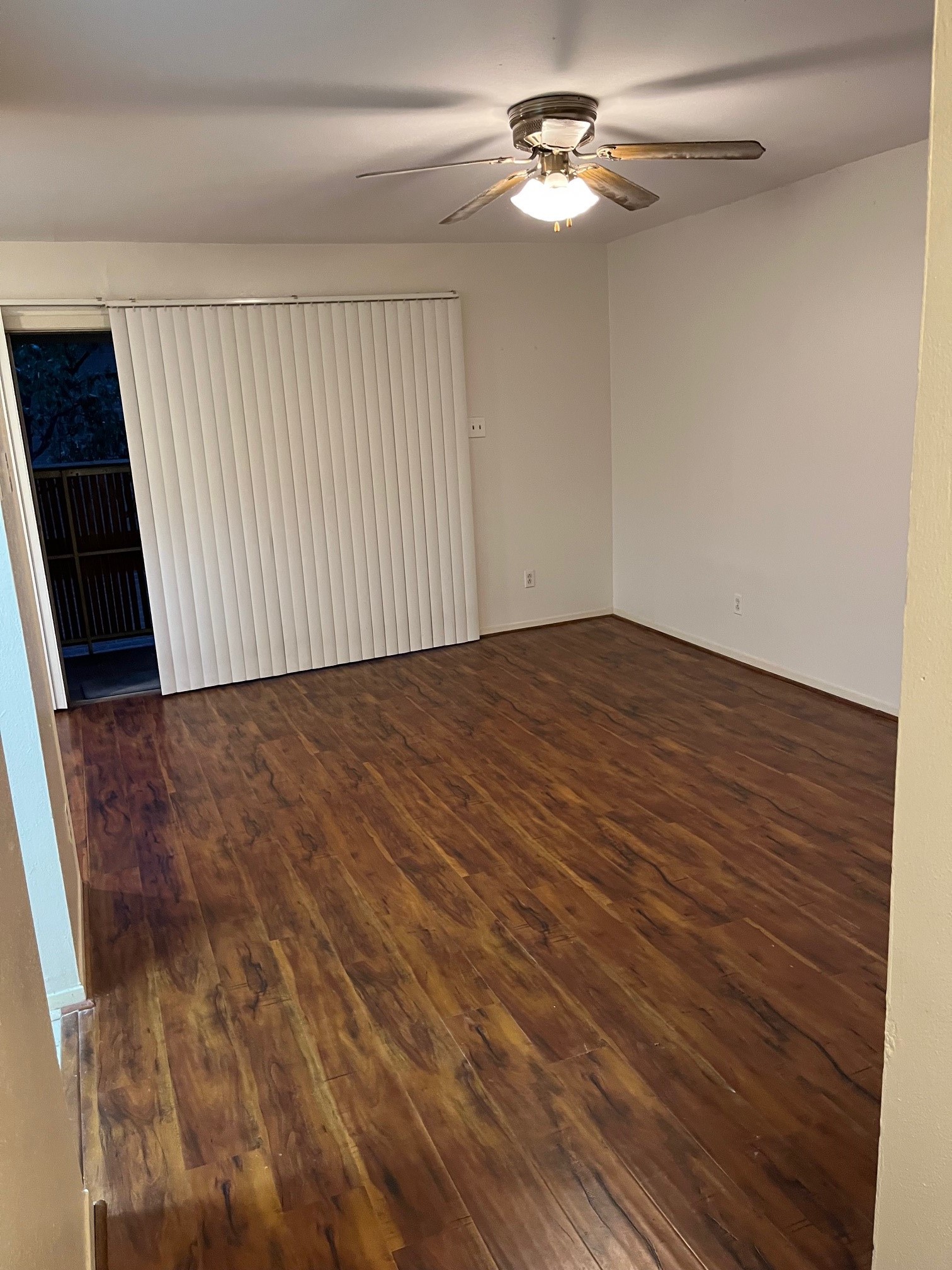 3938 West Alabama Street, Unit 12 Houston, TX 77027 - Photo 24 of 25 Open living area with sliding glass door access to the private covered balcony.