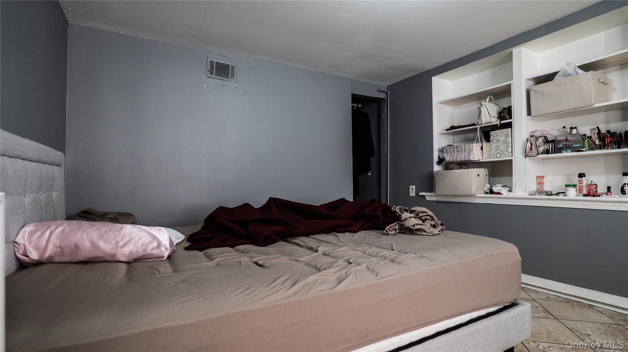 52 Beacon Street Newburgh, NY 12550 - Photo 9 of 12 Bedroom featuring light tile patterned floors