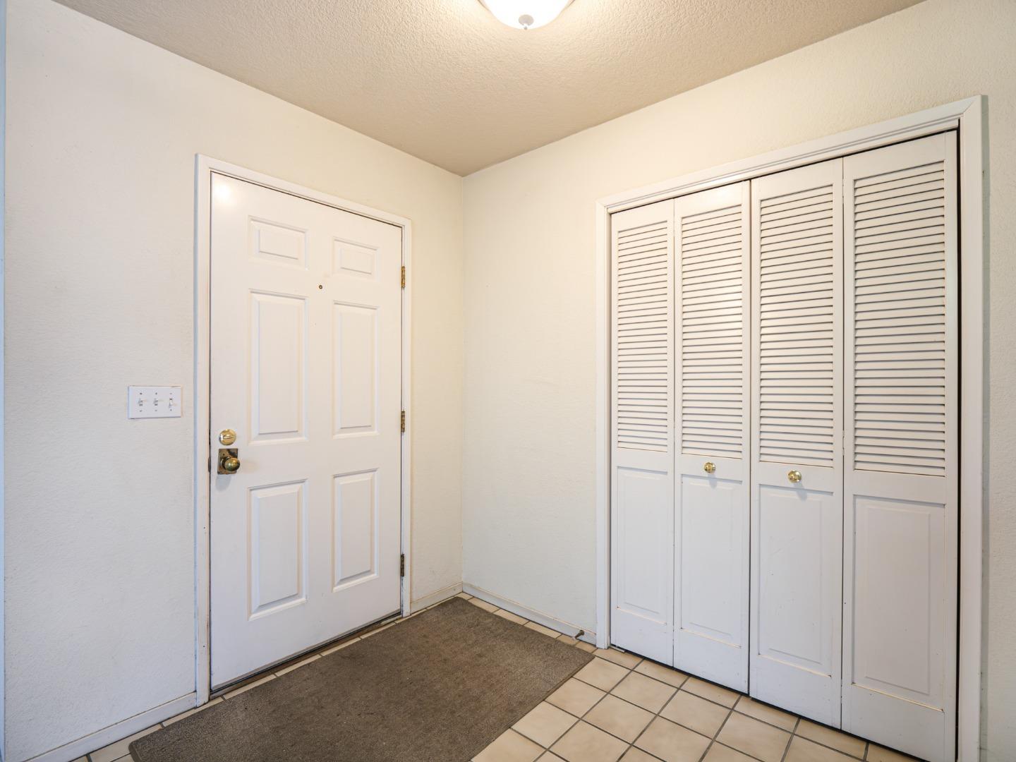 313 Sombra Watsonville, CA 95076 - Photo 11 of 37 an empty room with windows