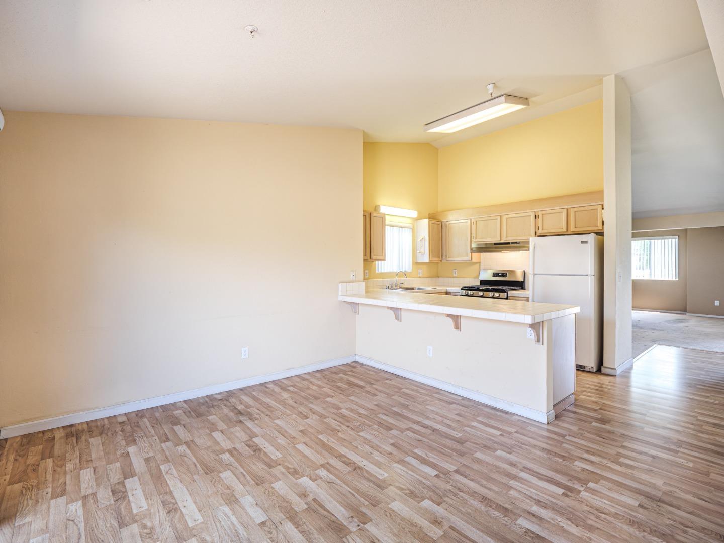 313 Sombra Watsonville, CA 95076 - Photo 21 of 37 a view of kitchen with wooden floor