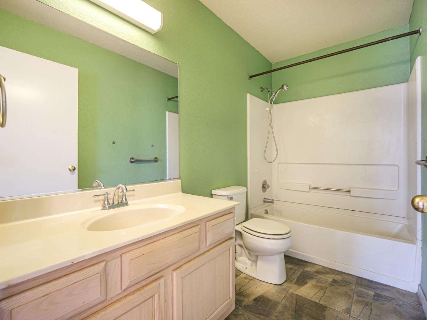 313 Sombra Watsonville, CA 95076 - Photo 37 of 37 a bathroom with a sink toilet and shower