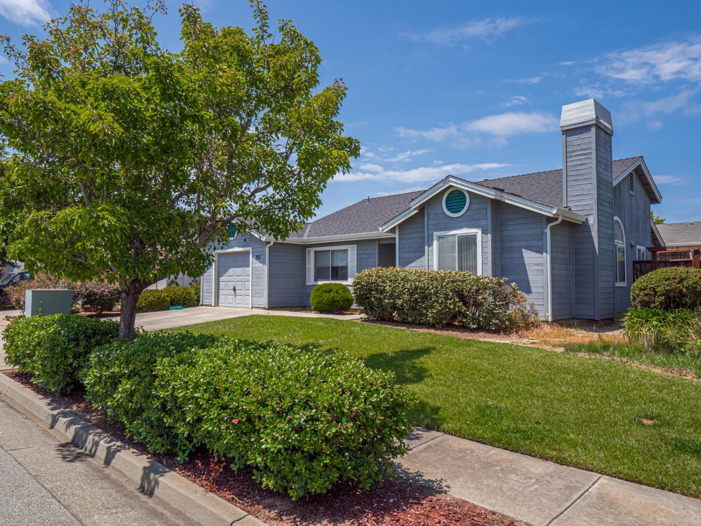 313 Sombra Watsonville, CA 95076 - Photo 5 of 37 a house view with a garden space