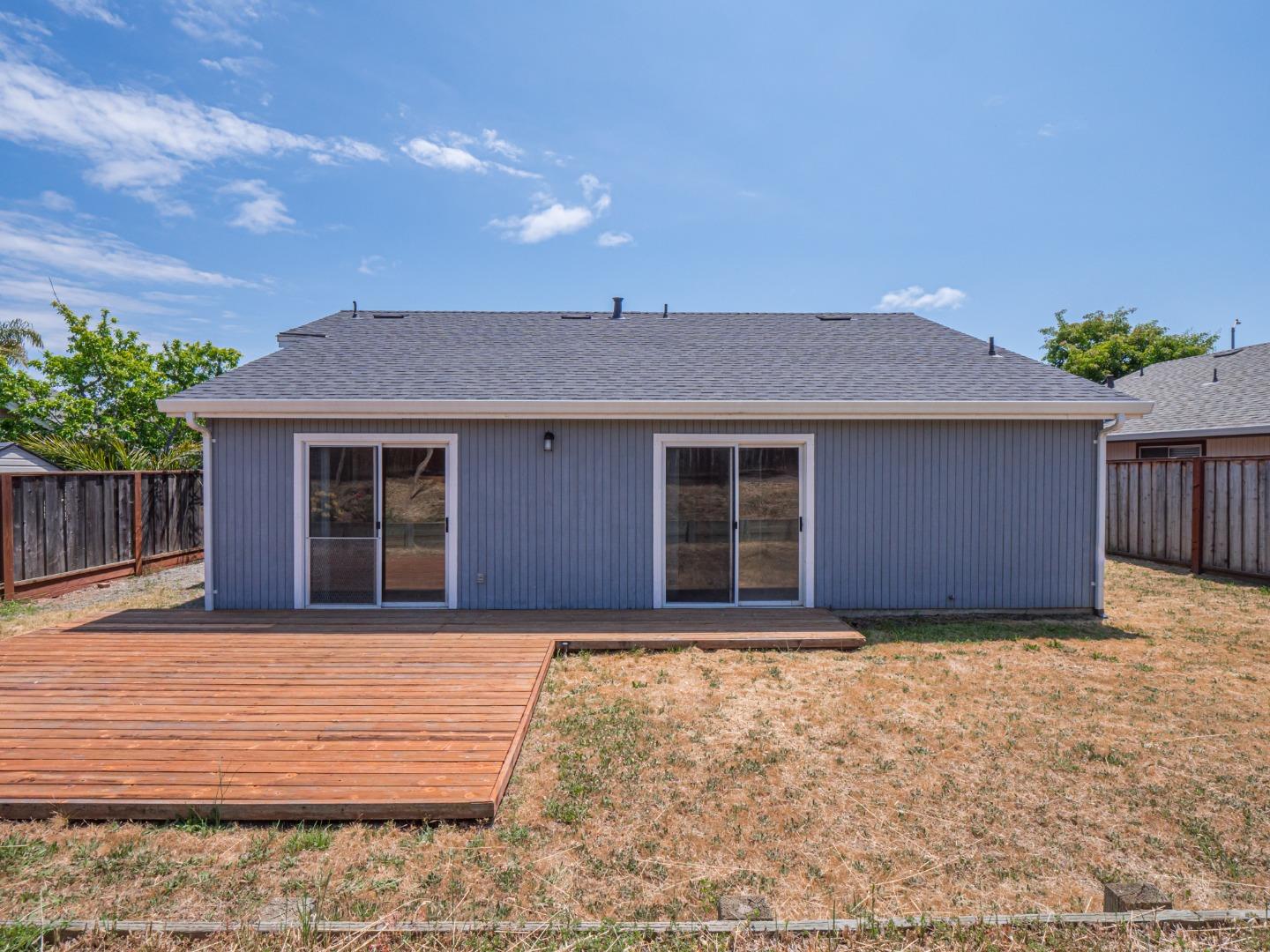 313 Sombra Watsonville, CA 95076 - Photo 9 of 37 a front view of a house with a yard