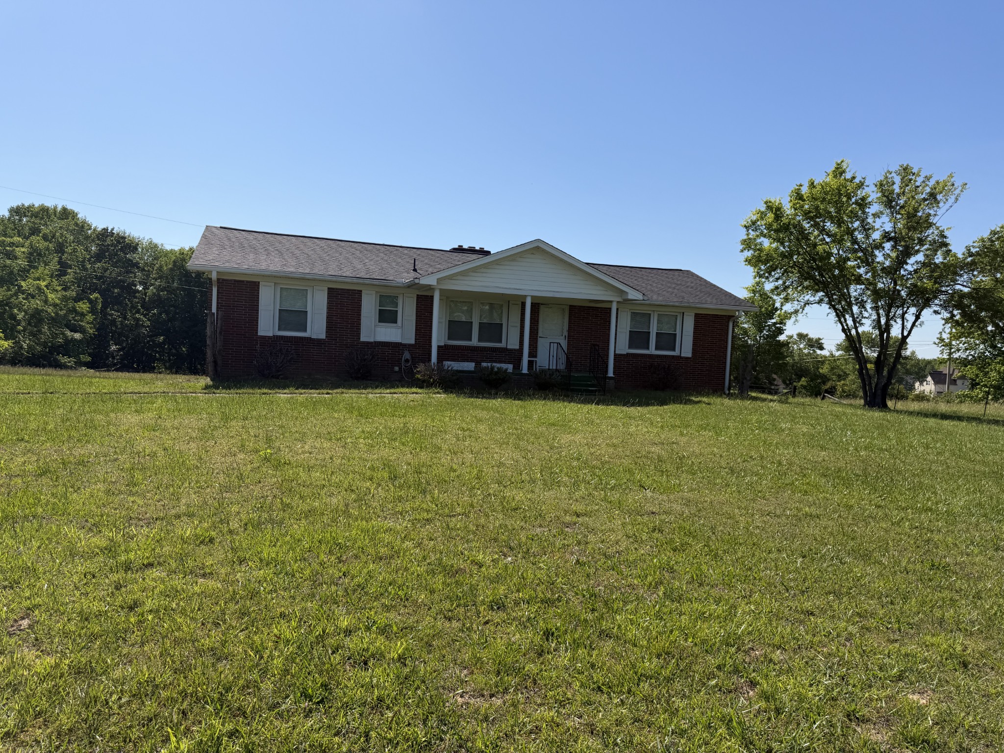 2276 South Mt Pleasant Road Greenbrier, TN 37073 - Photo 17 of 20 a front view of house with yard and green space