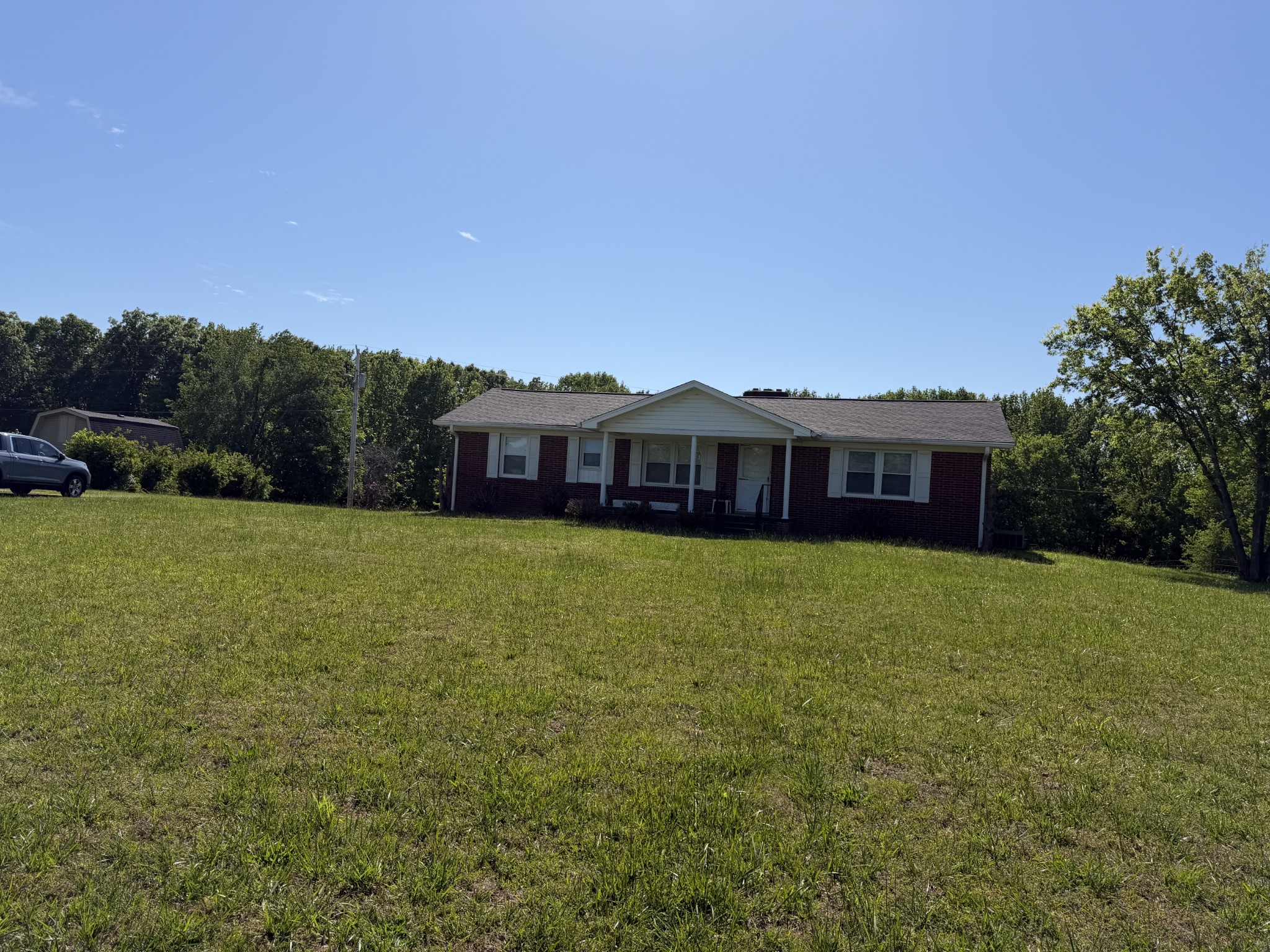 2276 South Mt Pleasant Road Greenbrier, TN 37073 - Photo 19 of 20 a front view of a house with yard and green space