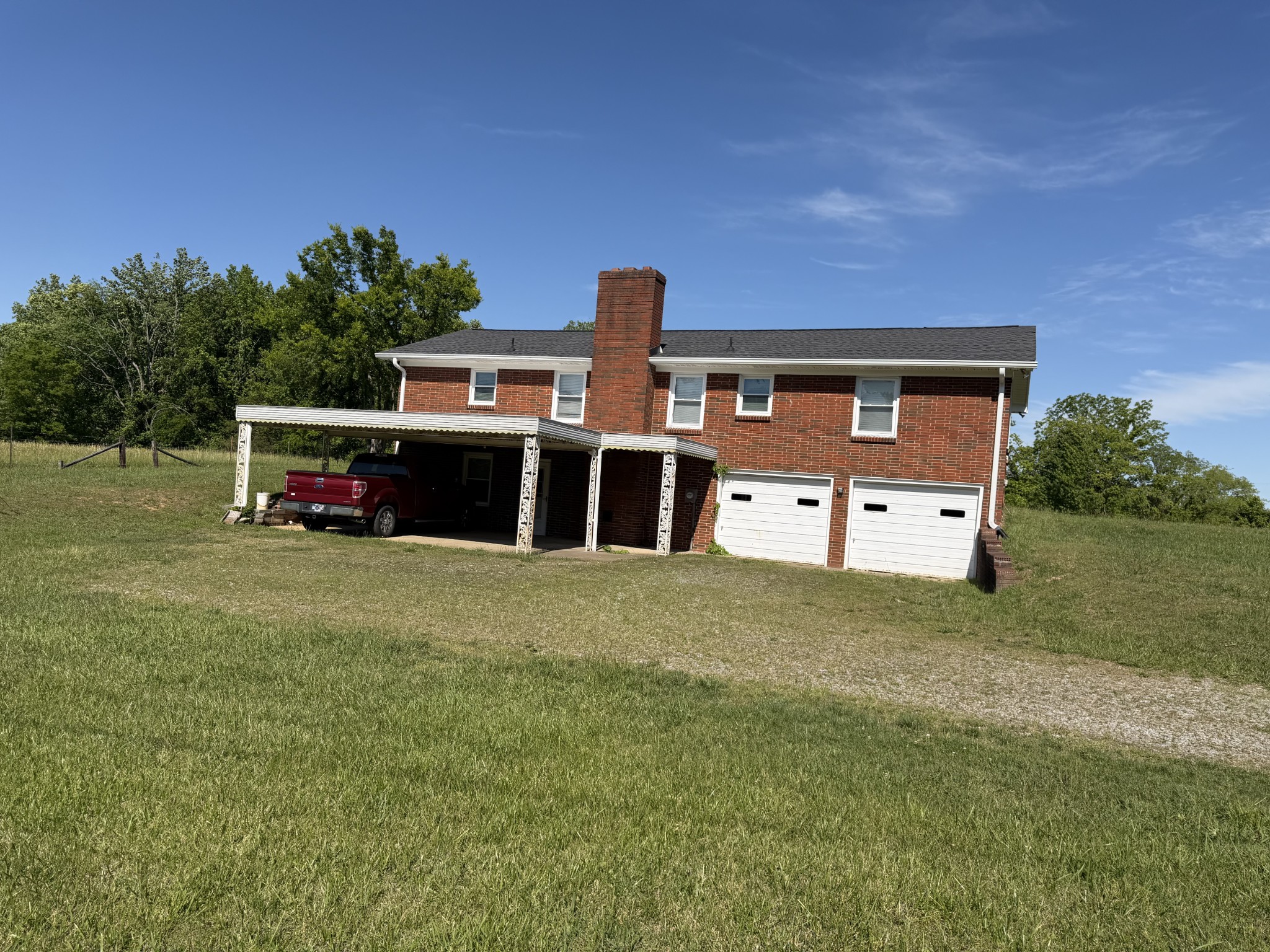 2276 South Mt Pleasant Road Greenbrier, TN 37073 - Photo 20 of 20 a front view of a house with a yard