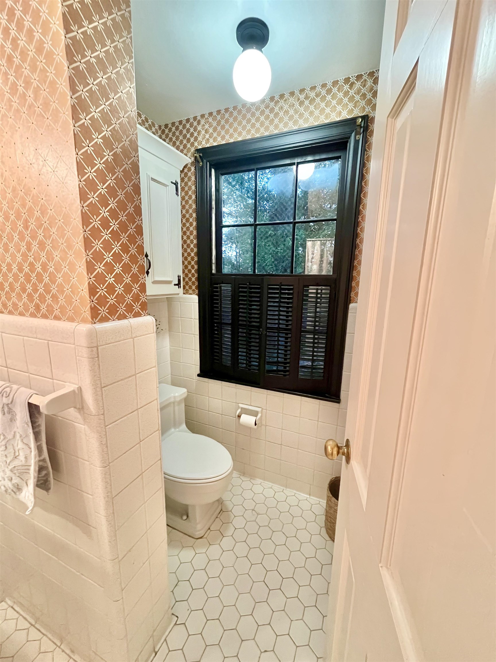 7273 Raleigh Lagrange Road Cordova, TN 38018 - Photo 10 of 30 Bathroom with wallpapered walls, tile walls, tile patterned flooring, and a wainscoted wall