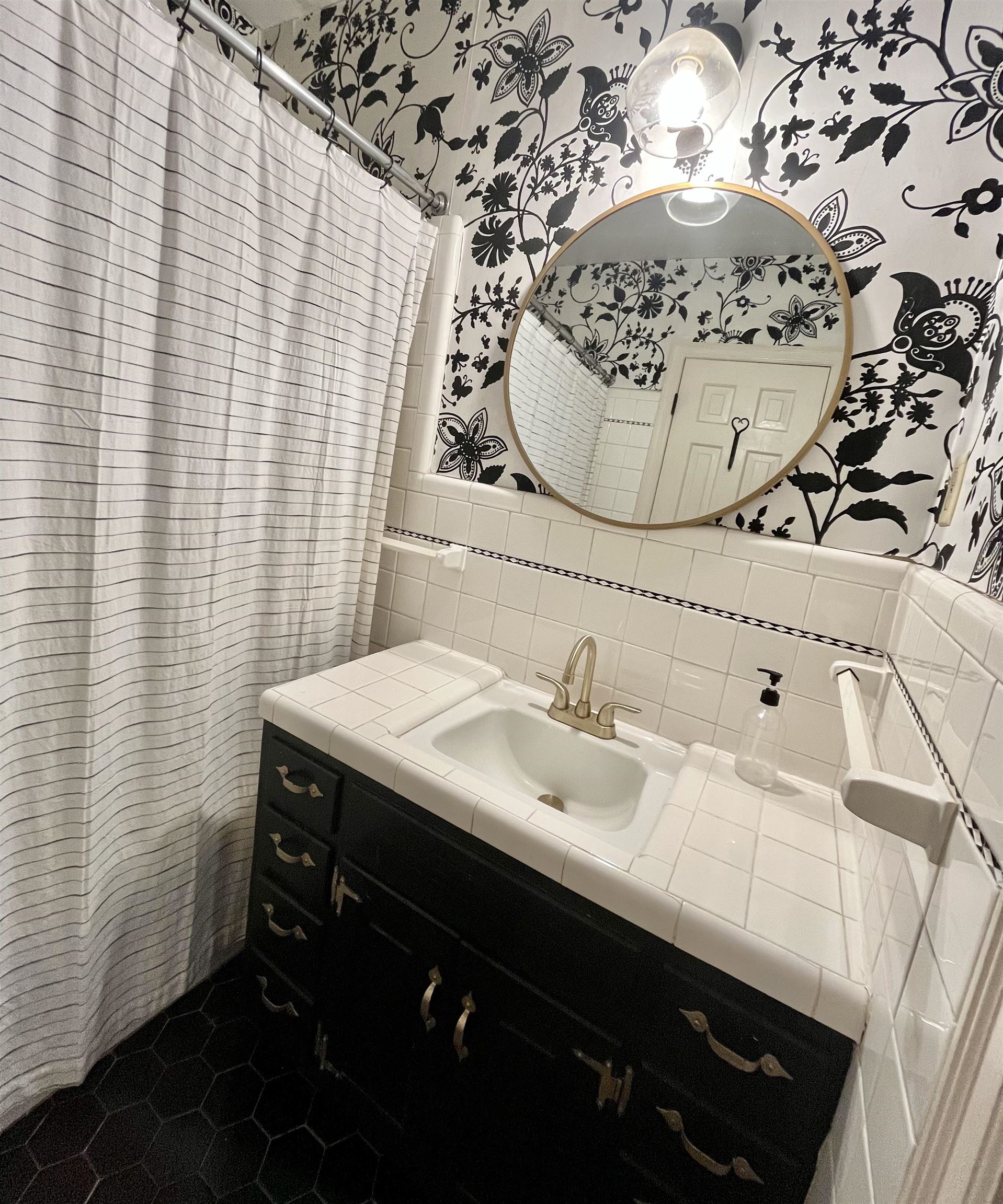 7273 Raleigh Lagrange Road Cordova, TN 38018 - Photo 23 of 30 Full bath with tile walls, vanity, wallpapered walls, decorative backsplash, and a shower with shower curtain