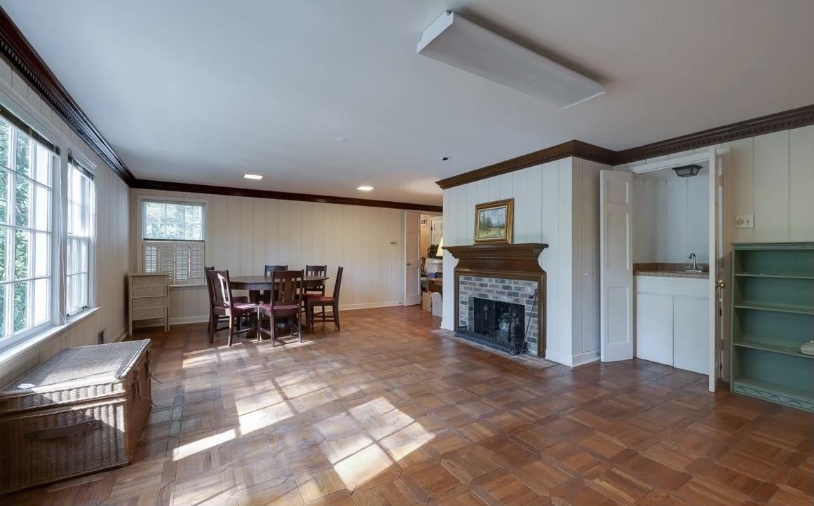 7273 Raleigh Lagrange Road Cordova, TN 38018 - Photo 9 of 30 Living room featuring crown molding and a fireplace