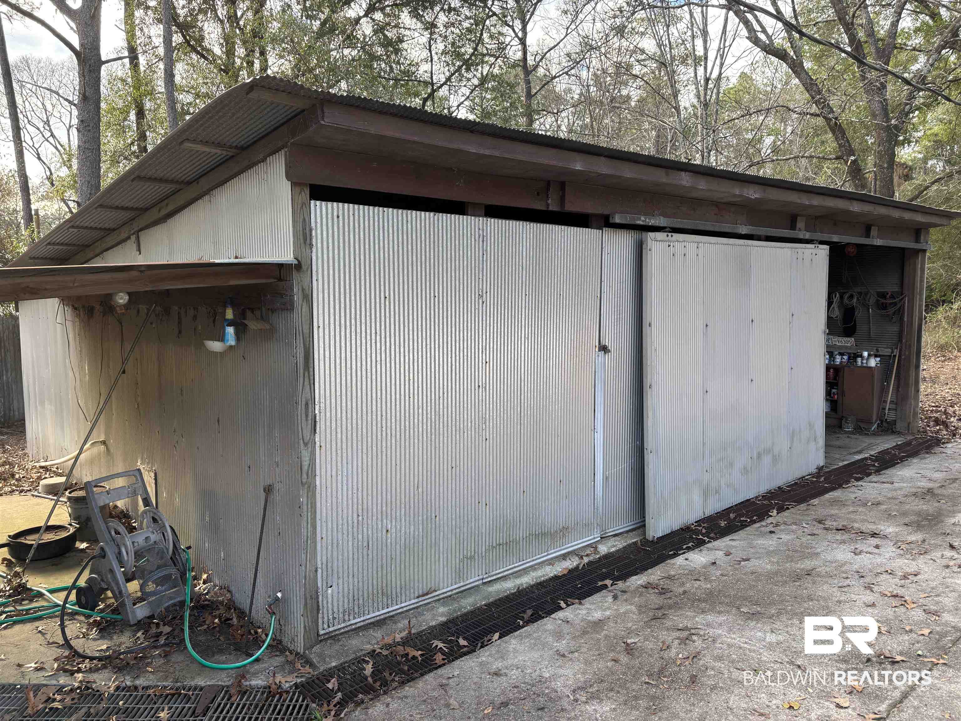 15575 Rogers Drive Chunchula, AL 36521 - Photo 16 of 42 View of outdoor structure featuring an outdoor structure