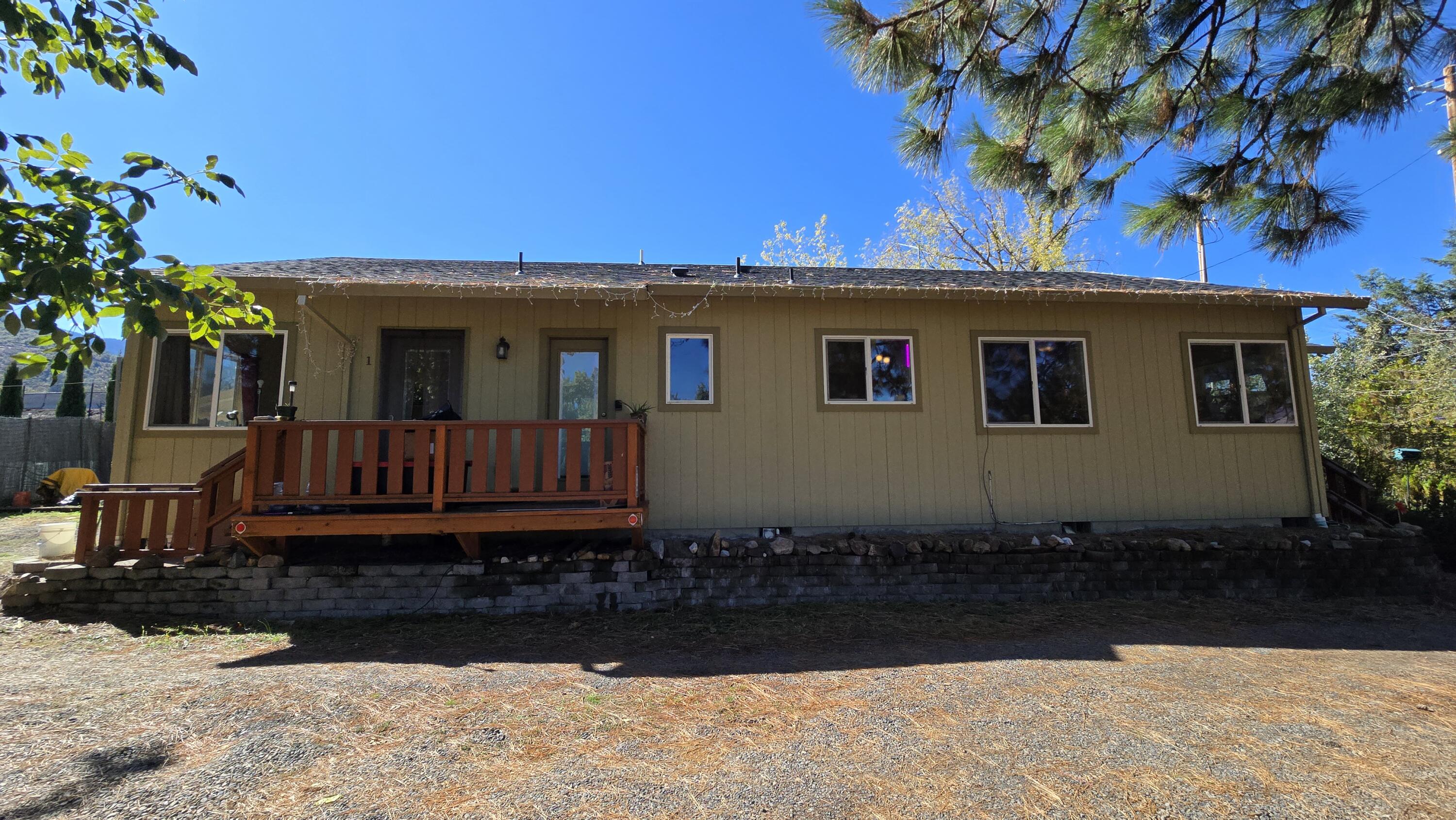 488 Crowson Road Ashland, OR 97520 - Photo 7 of 30 a view of a house with a yard
