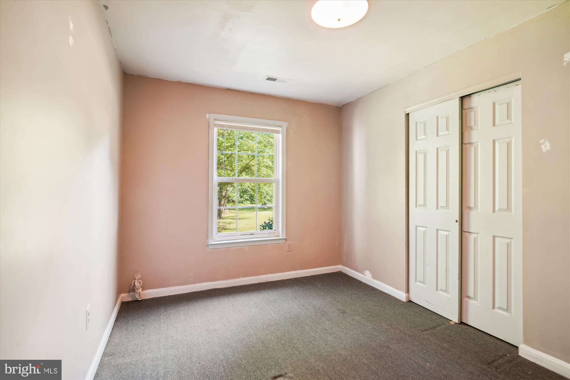 14050 Oaks Road Hughesville, MD 20637 - Photo 11 of 22 an empty room with a window