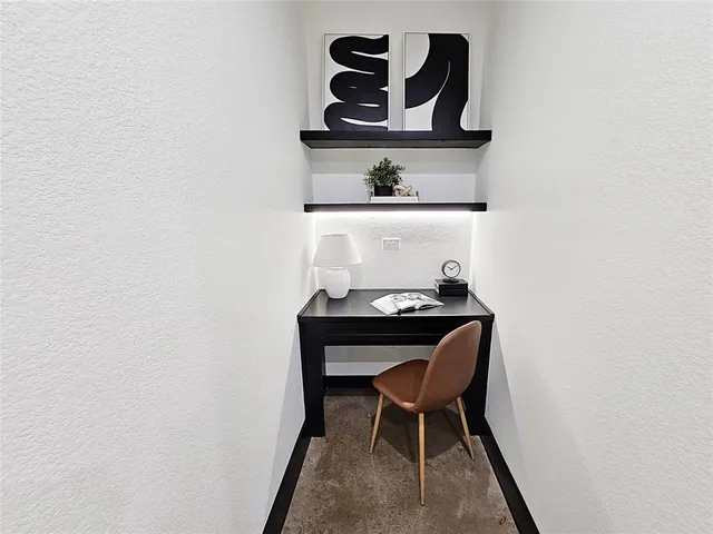 a table that has a sink and chair