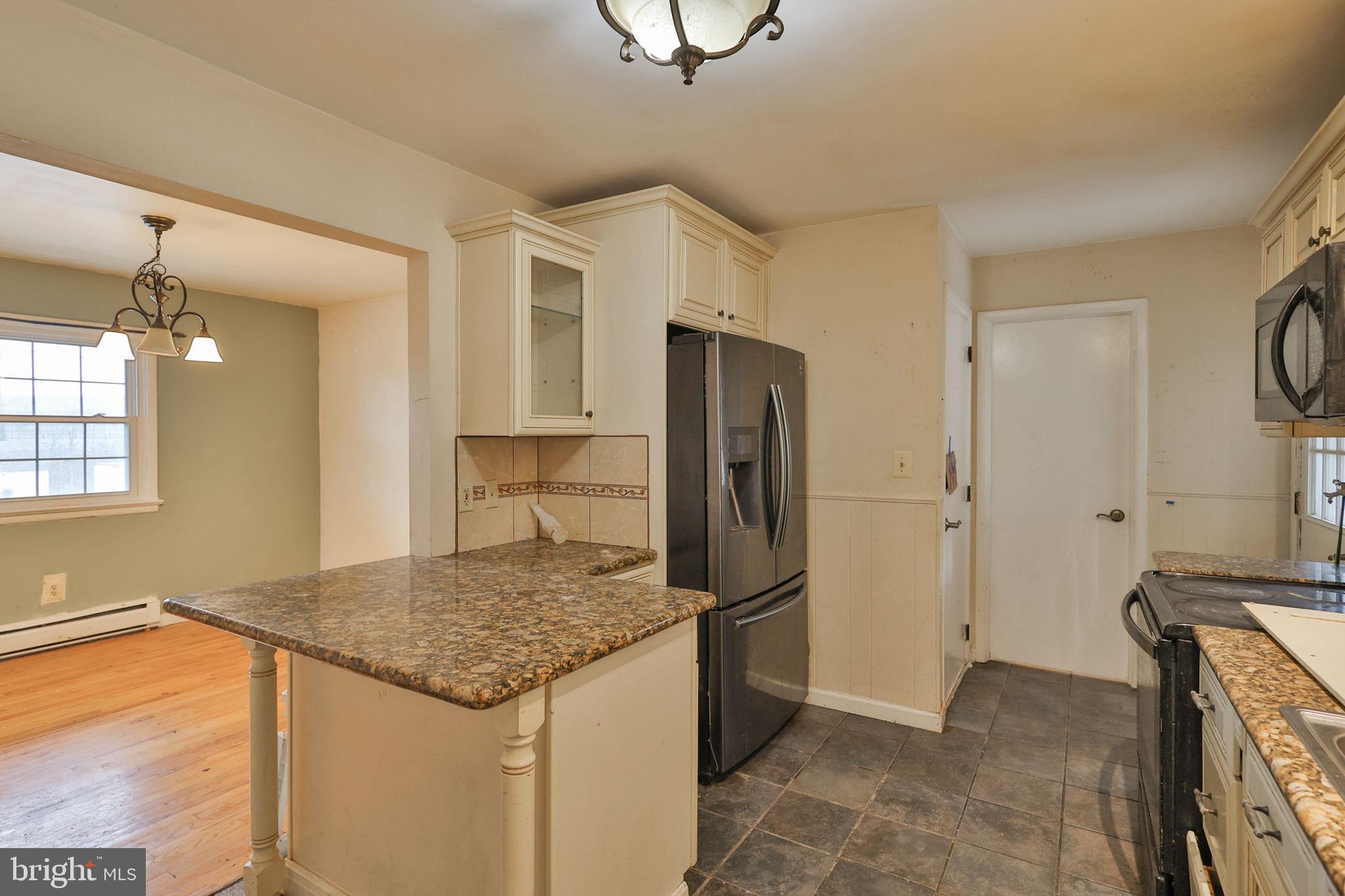 210 South 16th Street Emmaus, PA 18049 - Photo 20 of 92 a kitchen with a refrigerator and countertop