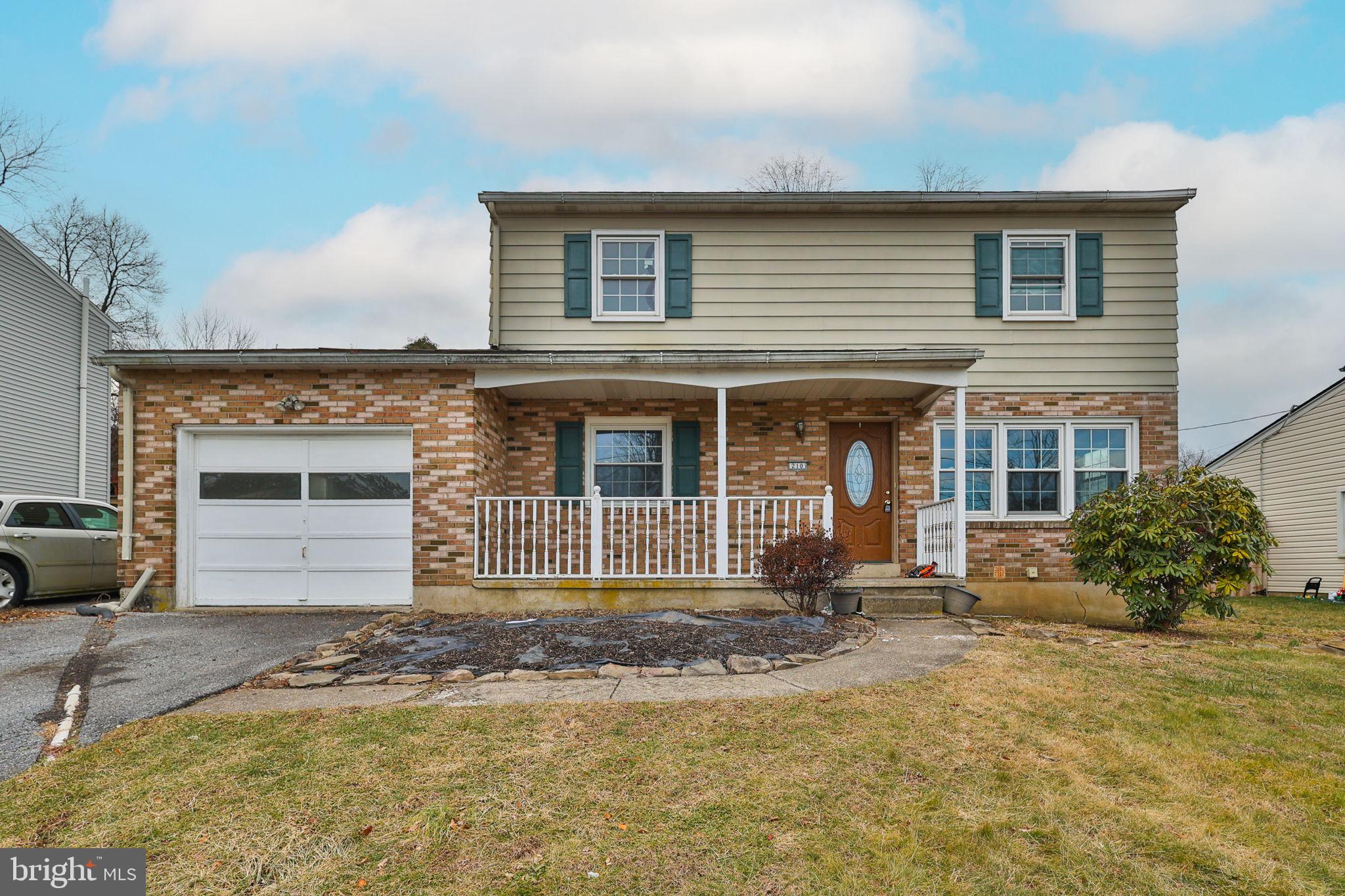 210 South 16th Street Emmaus, PA 18049 - Photo 2 of 92 front view of a house with a outdoor space