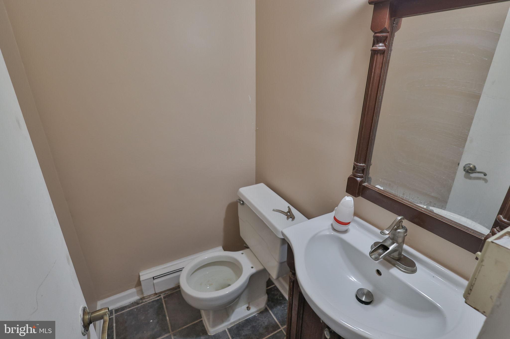 210 South 16th Street Emmaus, PA 18049 - Photo 26 of 92 a bathroom with a sink and a toilet