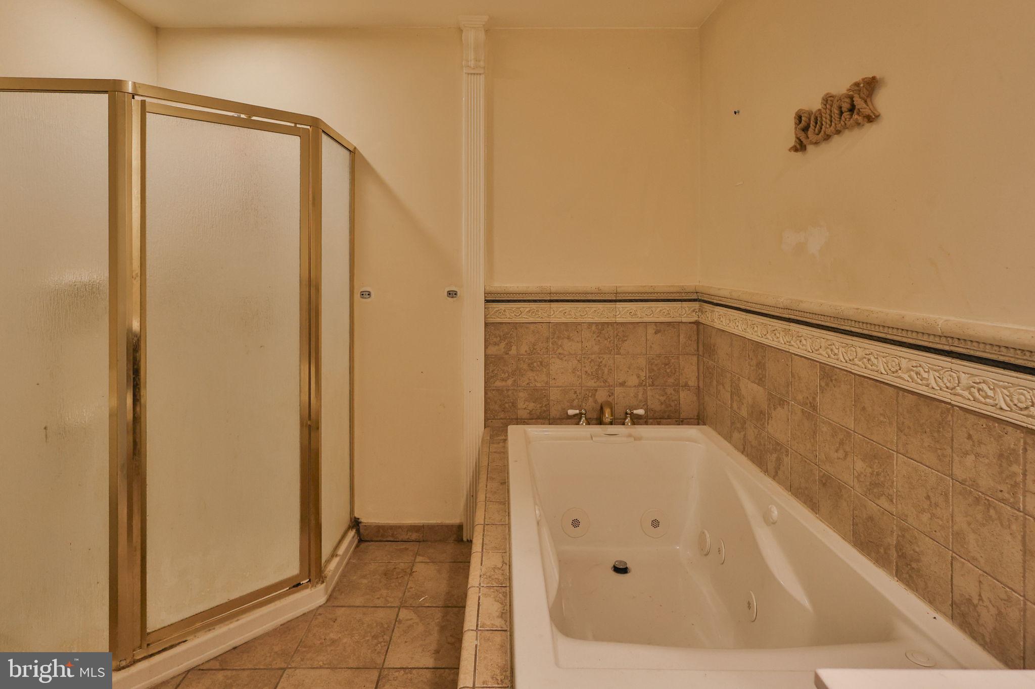 210 South 16th Street Emmaus, PA 18049 - Photo 48 of 92 a bathroom with a shower and a tub